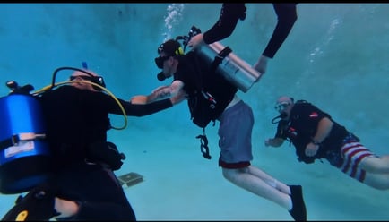 Zack Collie scuba diving with Diveheart