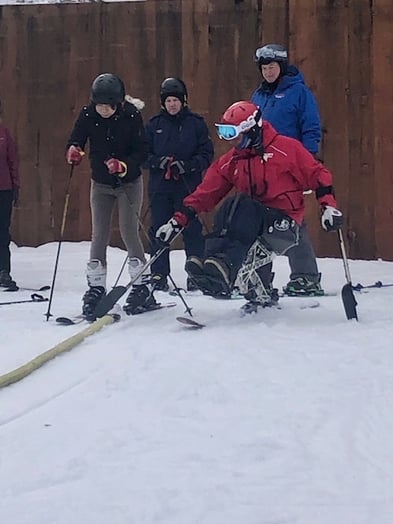 Geoff teaching skiing lessons