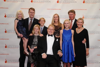 Travis Roy and his family at the Reeve Foundation's A Magical Evening in 2014.