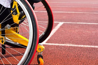 wheelchair wheels on outdoor track
