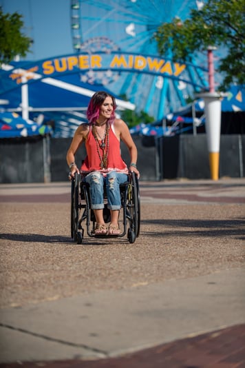 woman in wheelchair at fair