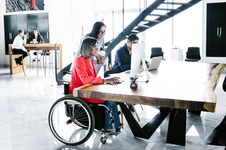 Woman working in a wheelchair