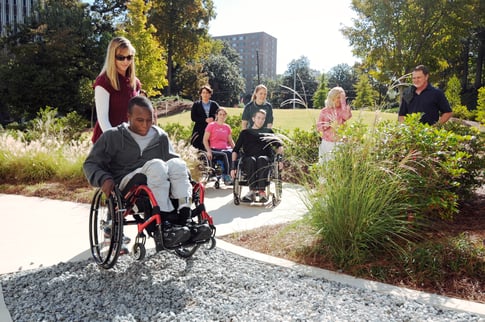 Wheelchair users with attendants