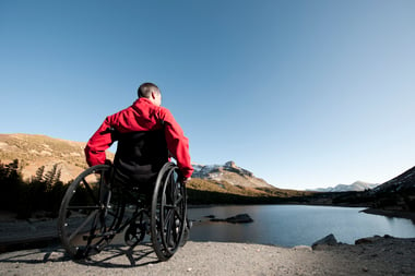 male in wheelchair outdoors