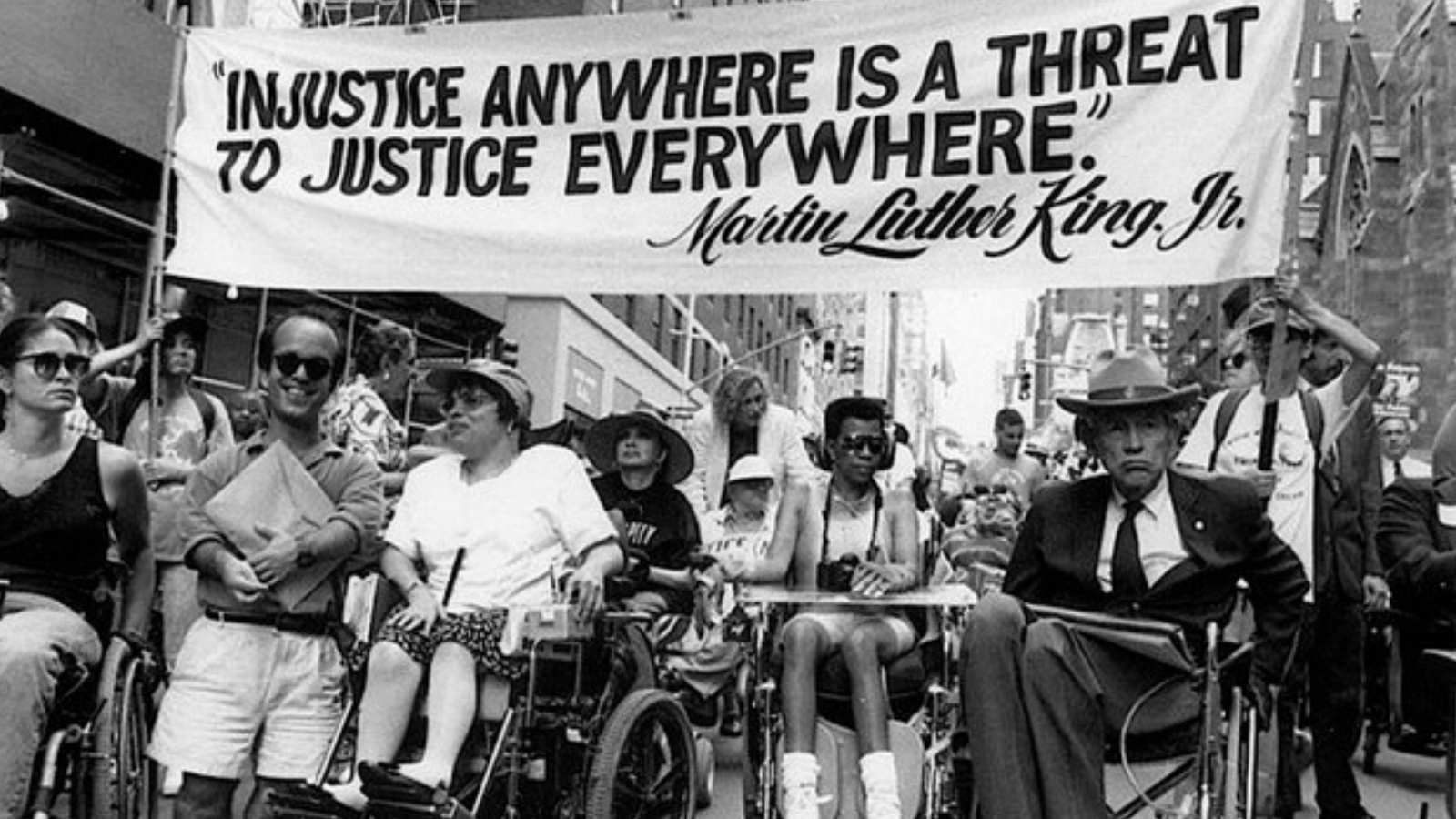 Image of protest with wheelchair users