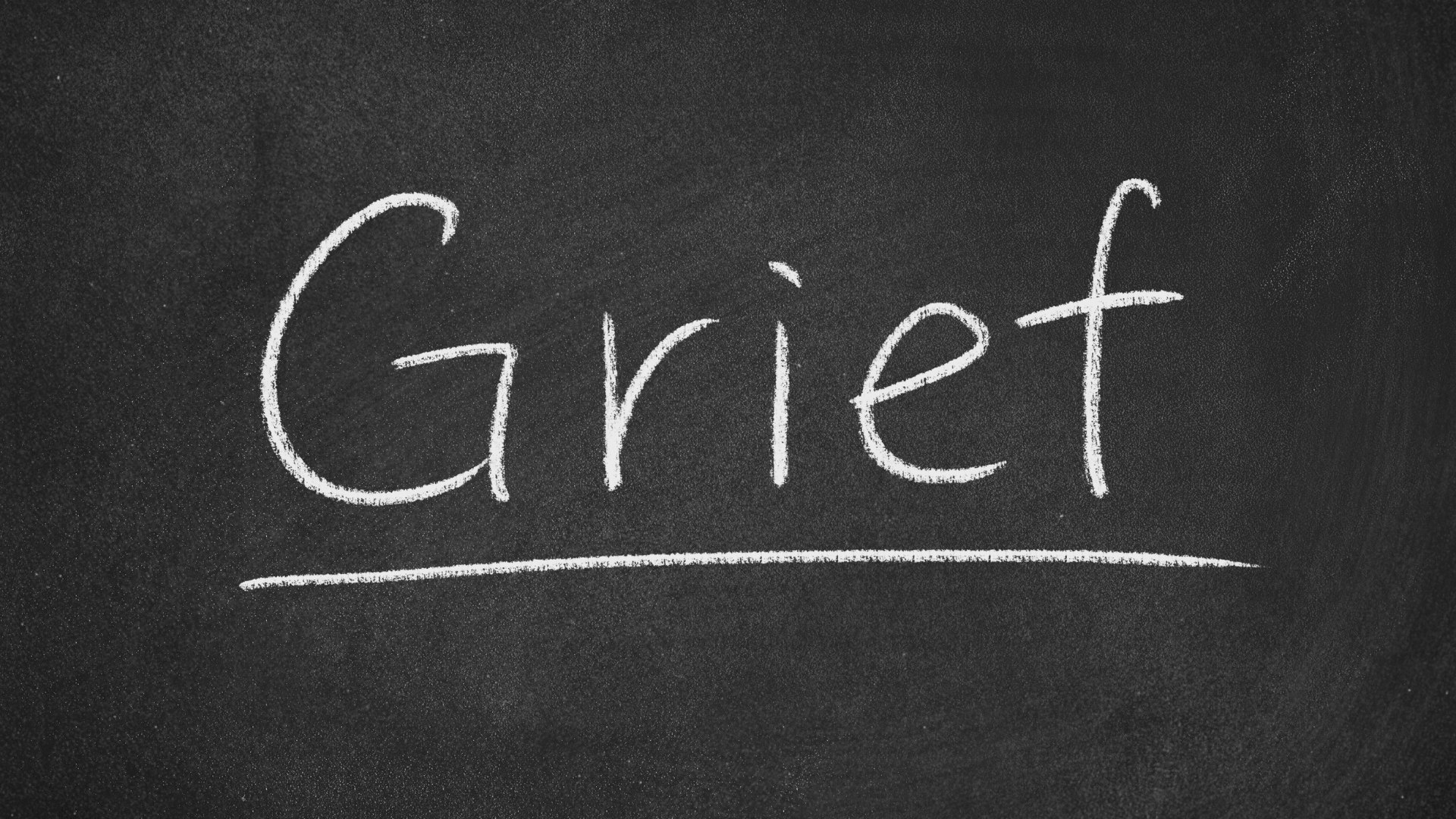 Grief text on chalkboard