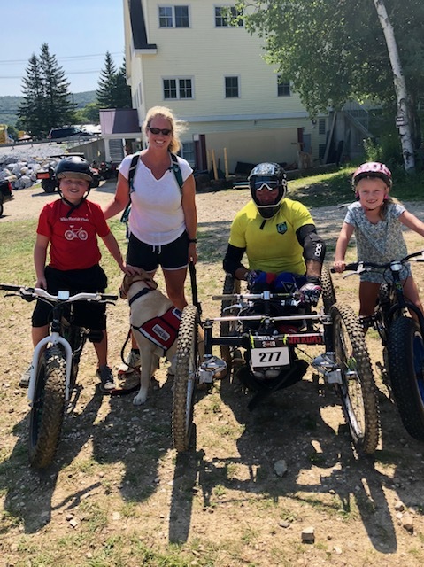 Heather and her family with bikes 