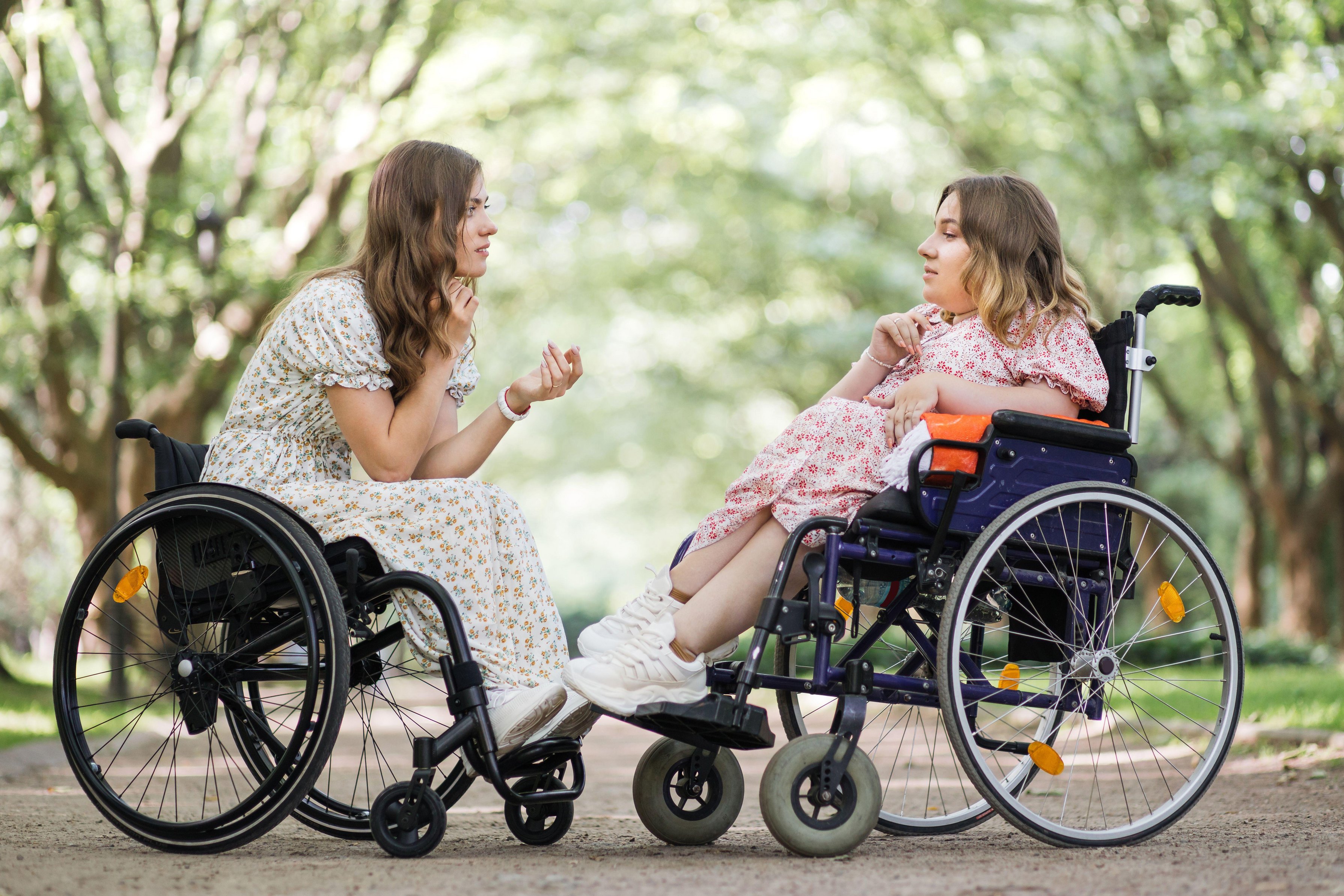 two women in wheelchairs 