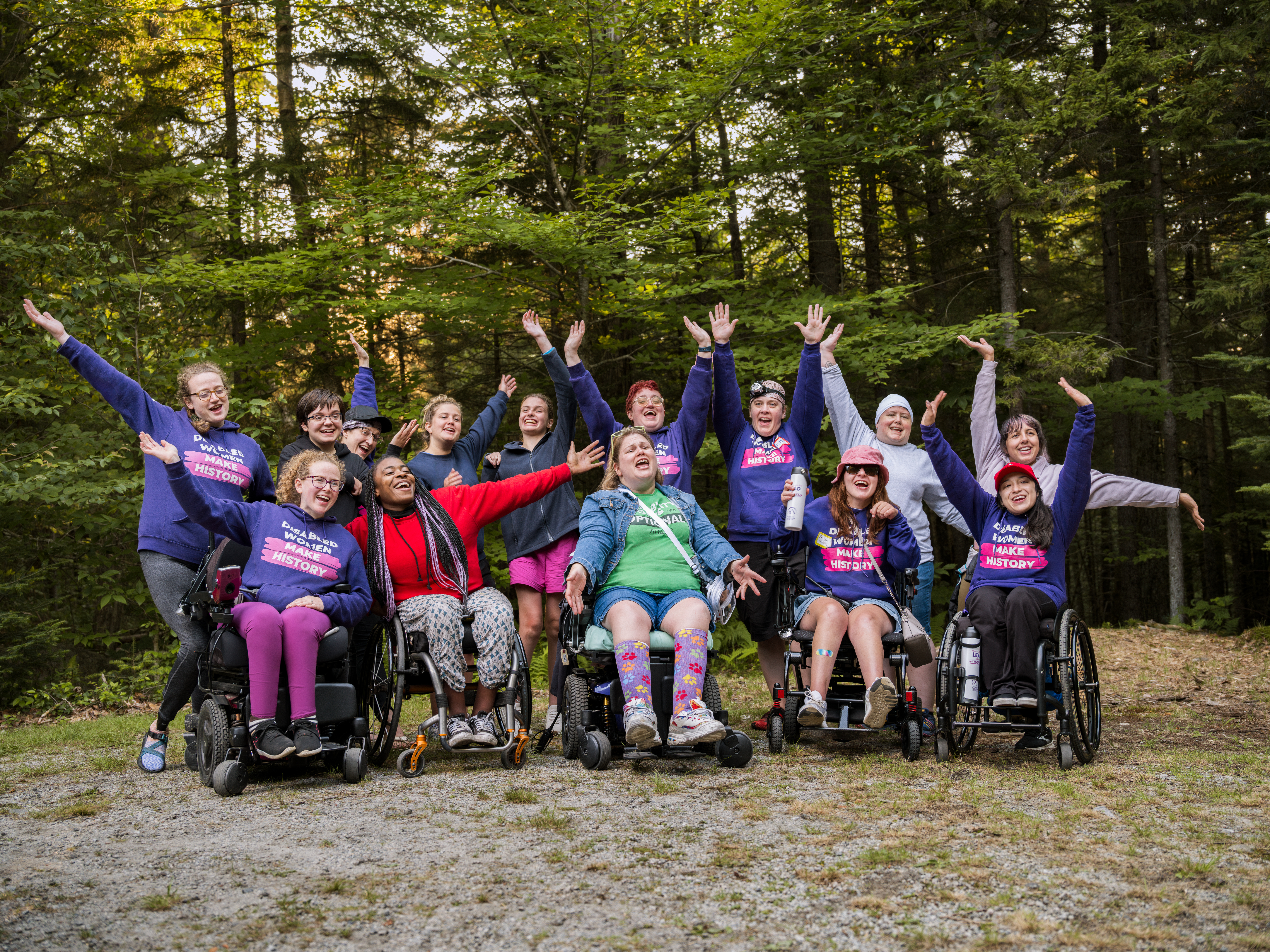 Able-bodied and Women in wheelchairs outdoors