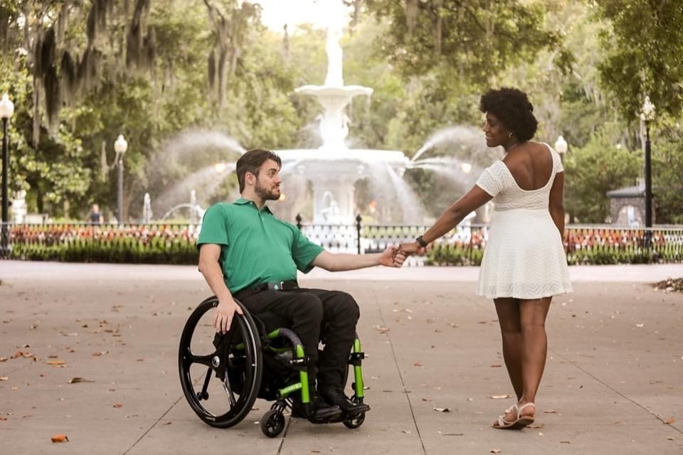 felica and husband at park holding hands